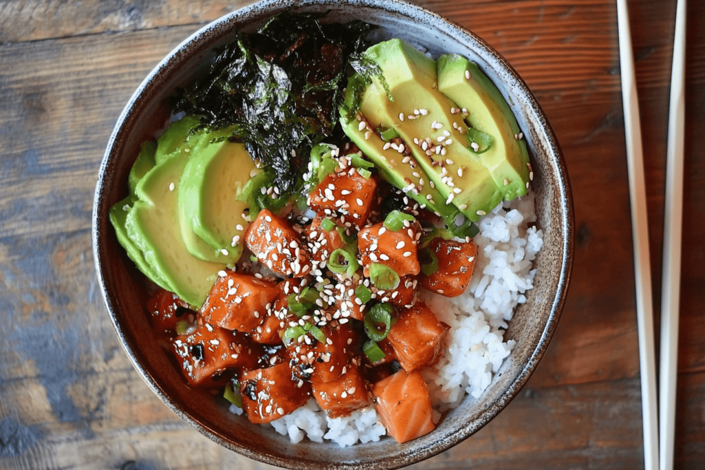Salmon Poke Recipe: Fresh, Flavorful And Incredibly Easy To Make : Fresh salmon poke bowl with avocado, seaweed, and sesame seeds